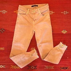 J BRAND dusty rose skinny jeans with distressed bottom